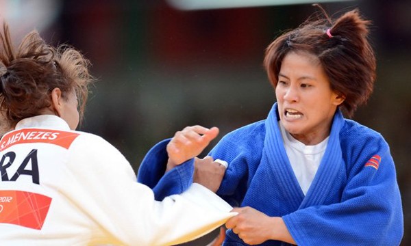 Võ sĩ Văn Ngọc Tú (phải) mang về cho Việt Nam vé thứ 19 tại Olympic 2016